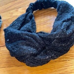 Womens bow type headband with silver thread detail.